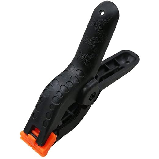 Abrazaderas de resorte de 5 cm, herramientas de carpintería, abrazaderas de nailon de plástico para carpintería, clip de resorte, fondo de estudio fotográfico, moda inteligente