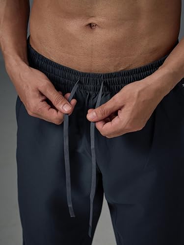 Image of TECHNOSPORT Mens Regular Fit Solid Woven Track Pant for Activewear, Regular Use and Quick Dry, (Non- Stretchable)