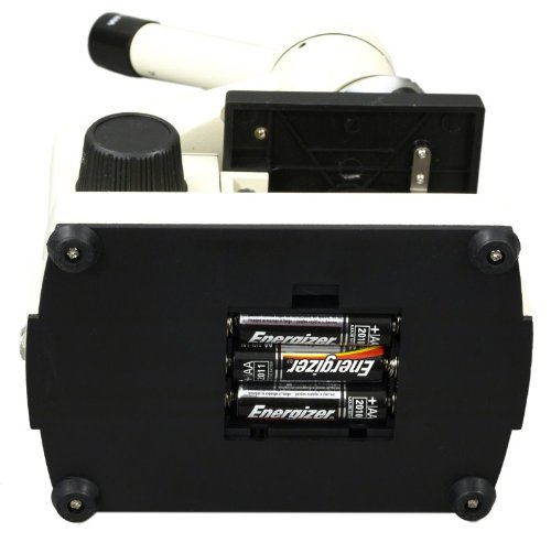 Bottom view of microscope showing battery compartment