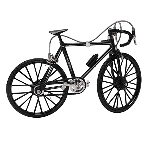 Bicicleta en miniatura para decorar el alféizar de la ventana de casa