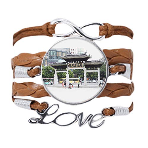 Bracelet en cuir noir tressé avec motif architecture chinoise traditionnelle