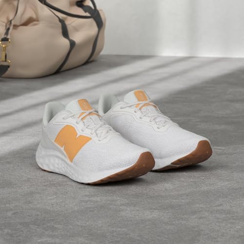 New Balance Women's Fresh Foam Arishi V4 Running Shoe, Sea Salt/Orange Fuzz, 5.5 Wide2