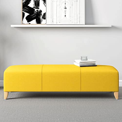 Banc ottoman peu encombrant jaune pour optimiser l'espace des petits salons - 2