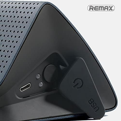 Close-up of Remax RB-M7 speaker ports and buttons
