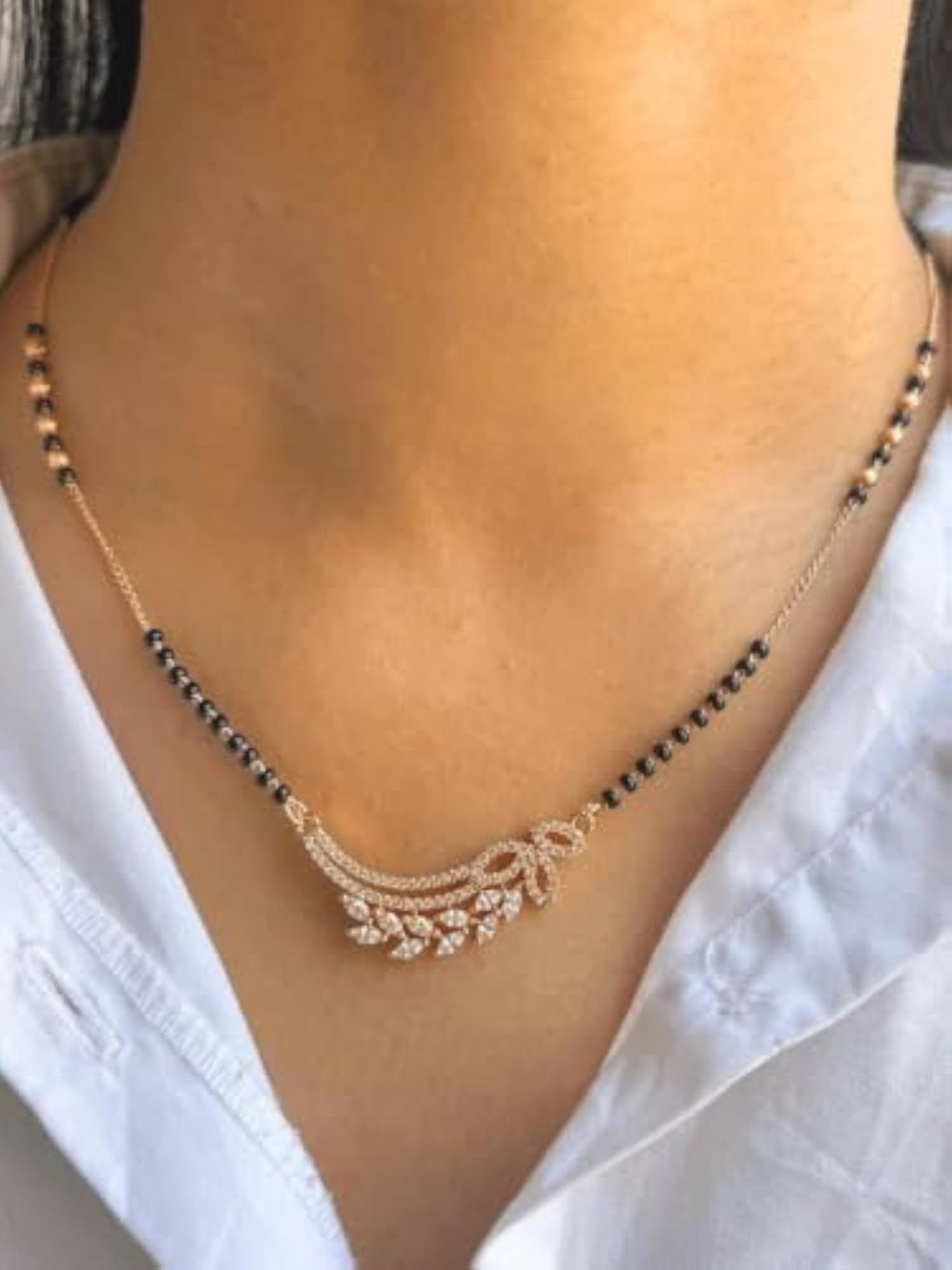 Women's Golden Plated Leaf Mangalsutra with Black Beads