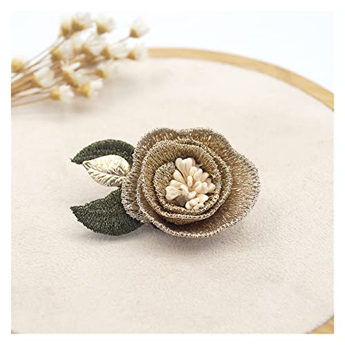 Broche fleur tissu rose pour fixer echarpe et chale glissant