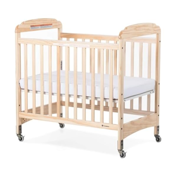 Foundations serenity compact clearview daycare baby crib fixed side durable wood construction adjustable mattress board clear end panels includes 3 infapure foam mattress natural  urban country home decor