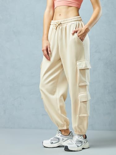 Image of Bewakoof Women's Fleece Super Loose Fit Joggers|Bewakoof Heavy Duty 1.0 | Track pants for woman | Lower for women | Multipurpose | Activewear | Utility Pockets | Lightweight & Flexible Elastic Waist | Casual Joggers | Loose Fit