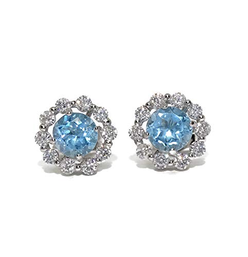 Boucles d'oreilles or blanc 18 carats et topaze bleue d'une élégance rare