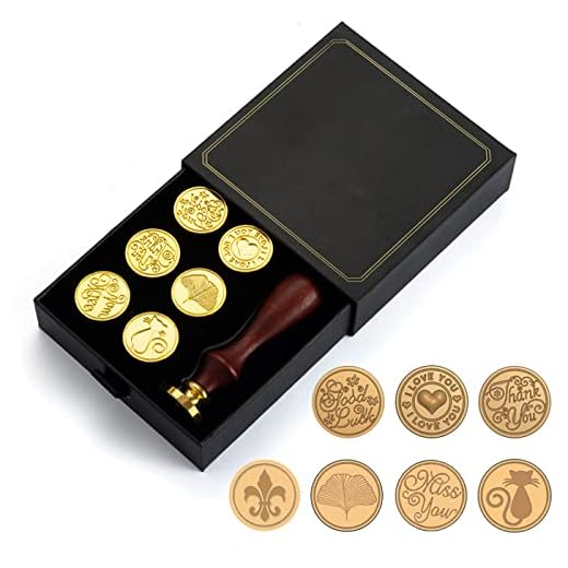 Juego de Sellos de Lacre, Kit de 7 sellos + Mango de Madera para sellar con cera. Caja Vintage para regalo, invitaciones, cartas o postales. Pack de sellos con cabezal intercambiable.