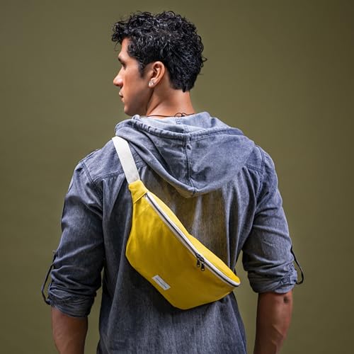 Image of The Peacock Crew Canvas Crossbody Sling Bag for Men & Women - Adjustable Strap, Dual Zippers Left /Right Handed, Secure Everyday Travel Fanny Pack Shoulder Pouch, Trekker Yellow Gold, 14.5 x 6.3 x 3.6