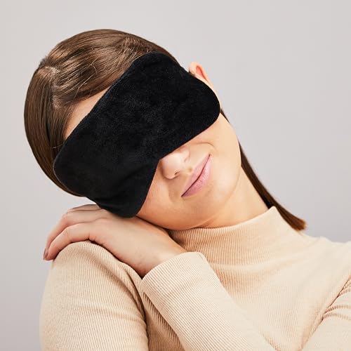 Image of Amazon Basics Sleeping Eye Mask | Super Smooth, Velvet Fabric, Secure Fit | Soft & Comfortable Blindfold for Travelers | Ideal for Airplane, Car, Office & Home | Relaxation & Eye Pain Relief (Black)
