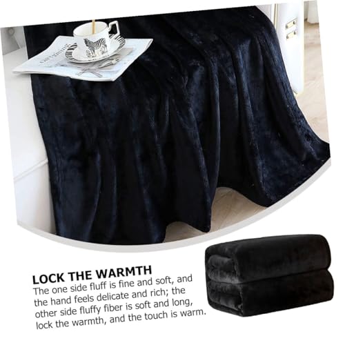 Couverture polaire douce noire confortable contre le froid de la climatisation