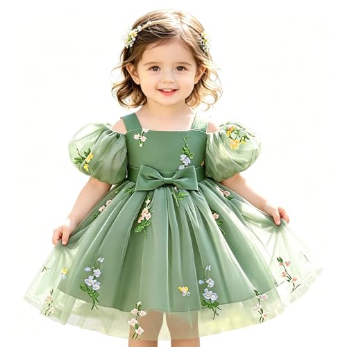 Vestido de niña elegante con detalles florales y mangas bordadas