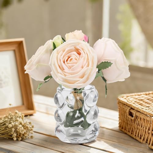 Fleurs artificielles dans un vase roses maison et mariage