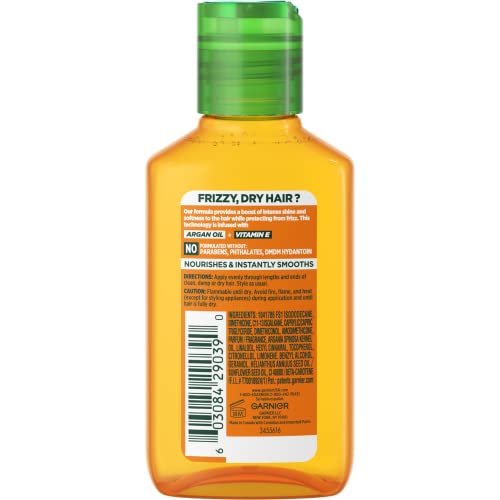 Cheveux rebelles et frisés secs apaisés par le fluide Garnier lisse et brillant - 2