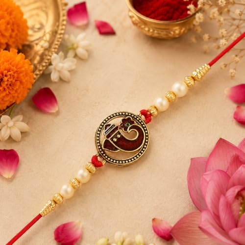 Image of Riddhika Ventures Religious Gold Plated Meenakari Sacred Ganesha Rakhi with Roli Chawal and Greeting Card