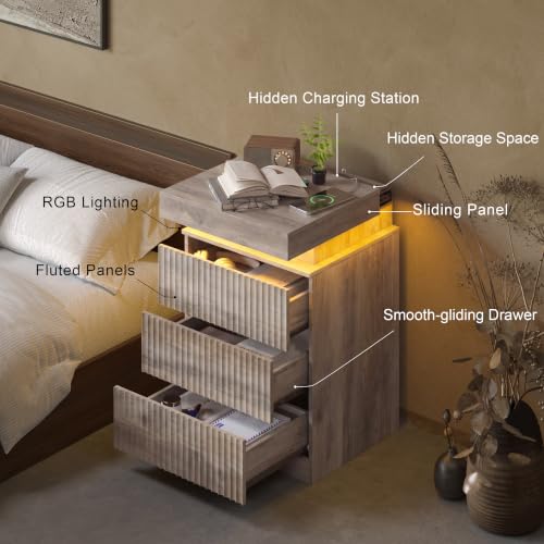 Image of Nightstand Bedside Table with Charging Station & LED Lights, Grey | RGB Lights, Hidden Sliding Top, 2 AC Outlets & 2 USB Ports, 3-Drawer Storage, Modern Fluted End Table for Bedroom