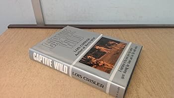 Hardcover Captive Wild: Nine Years with Wolves Book