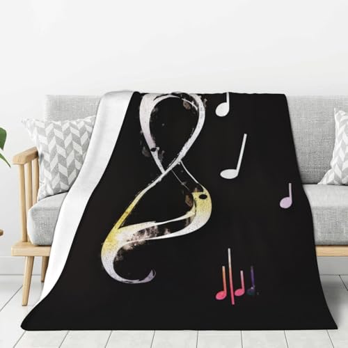 Couverture en flanelle notes de musique pour cocooning sur canapé