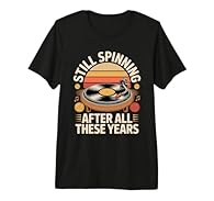 "Still Spinning After All These Years" - Perfect funny vinyl record saying for record collectors, crate diggers, and anyone whose life revolves around the turntable This premium t-shirt is made of 100% organic ring spun combed cotton. Unisex t-shirt ...