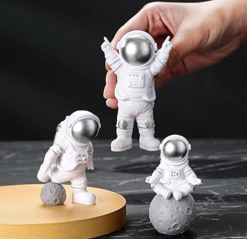 Image of VRB DecTM 3pcs Astronaut Miniature Showpiece Set for Home Decor, car Dashboard,Valentine,Living Room,Gifts Figurines,Cake Decoration Items-Resin (3 Pcs Small Silver Astronaut showpiece)