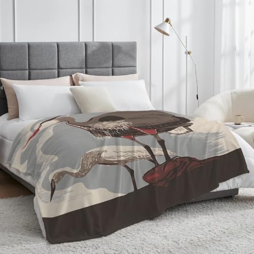 Plaid deux hérons douceur flanelle pour cocon de chaleur