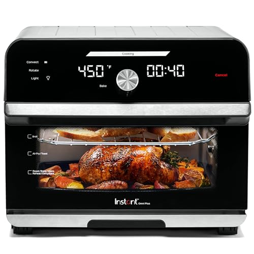 Instant Pot Omni Plus 19QT/18L Toaster Oven Air Fryer in matte black finish on a kitchen counter, the door open showing a 12-inch pizza on the included rack inside the spacious cavity, the air-fry basket and crisper rack visible above the pizza, digital touchscreen on the front showing the 10-in-1 function selection (Crisp, Broil, Bake, Roast, Toast, Warm, Convection, Air Fry, Dehydrate, Reheat), the Instant Pot logo at the top edge — the only true toaster-oven-air-fryer combo on this list and the single premium-tier exception above the $200 ceiling