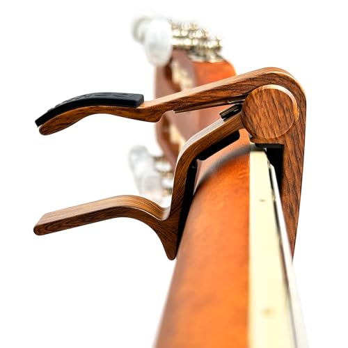 Miniatura 7 de Wingo Cejilla Guitarra Española Clásica Profesional Clasica Guitar Capo Ligero Aleación De Aluminio Con 5 Púas De Guitarra.