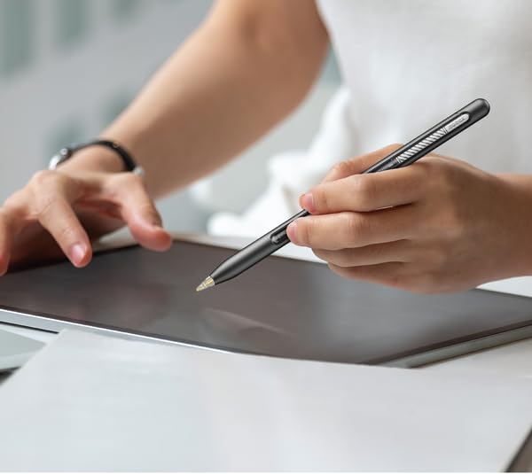 Person using MOMAX Mag.Link Pro stylus on an iPad