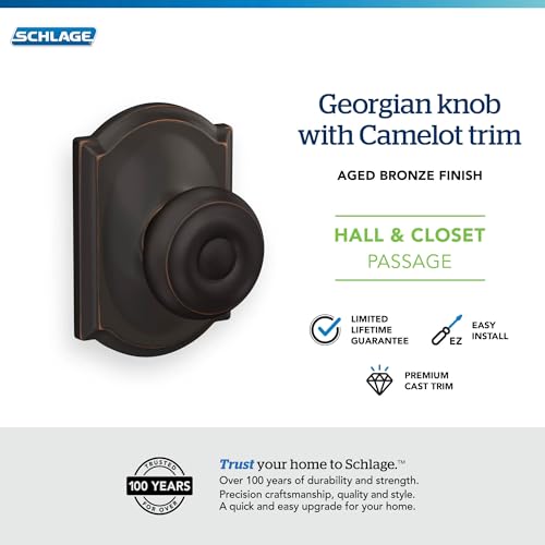 Image of Schlage F10 GEO 716 CAM Georgian Door Knob with Camelot Trim, Hall & Closet Passage Lock, Aged Bronze