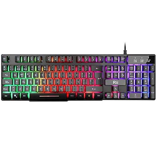 Rii RK100 Plus Teclado retroiluminado Gaming,7 Colores Rainbow LED,Teclado para Juegos con Cable USB,Disposición QWERTY Español | Ya disponible en tu tienda friki favorita! En mundofriki.es! Rii RK100 Plus Teclado retroiluminado Gaming,7 Colores Rainbow LED,Teclado para Juegos con Cable USB,Disposición QWERTY Español | Ya disponible en tu tienda friki favorita! En mundofriki.es!