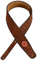 2 1/2 inch Signature Series suede guitar strap with black decorative piping. Adjustable from 38 inches to 53 inches. Also available in extra long (XL), which adds 12 inches to overall length.