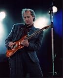 Posterazzi Mark Knopfler Playing Guitar In Striped Suit Photo Print (8 x 10) - Item # MVM54236