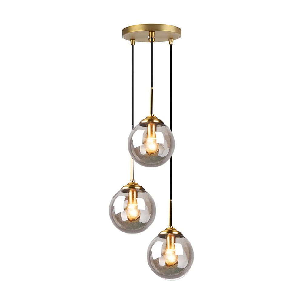 Lumière rétro pour cuisine sombre grâce au lustre suspendu globe en verre 3 feux