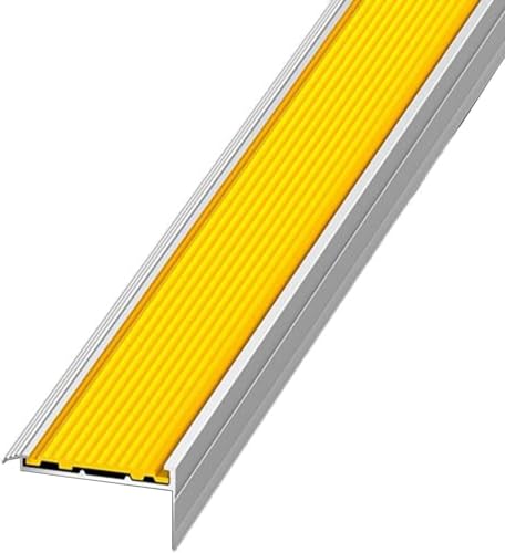 Nez de marche jaune pour éviter les chutes dans les escaliers publics