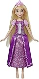Enthält: Rapunzel Puppe mit Krone und abnehmbarem Rock. 3 x 1,5V A76 (LR44) Batterien enthalten.