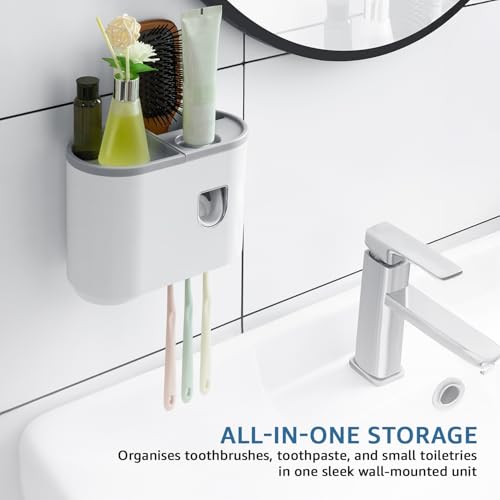 Image of Amazon Basics Wall-Mounted Toothbrush Holder with Automatic Toothpaste Dispenser | 1 Magnetic Cup | White | 20.5L x 10W x 14.5H cm