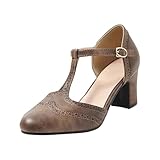 Les talons mi-hauts confortables et intemporels offrent un maintien élégant pour l'ensemble. Le design avec boucle à bout pointu assure un style rétro.