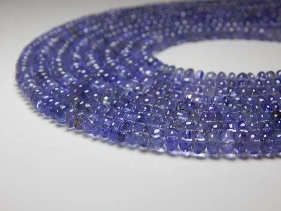 Tanzanite smooth rondelle beads pour concevoir un bijou unique chargé d'histoire