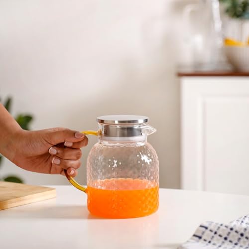 Image of Nestasia Transparent Glass Jug with Steel Lid (1100 ml) - Dishwasher & Microwave Safe Carafe with Dual Opening Strainer Lid - Oval Textured Glass Pitcher for Water, Juice, Hot & Cold Beverages