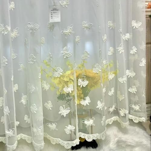 Voilage brodé blanc en polycoton pour sublimer la chambre à coucher