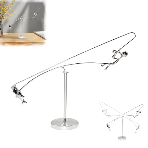 Escultura balanceante de pescador en metal cinético