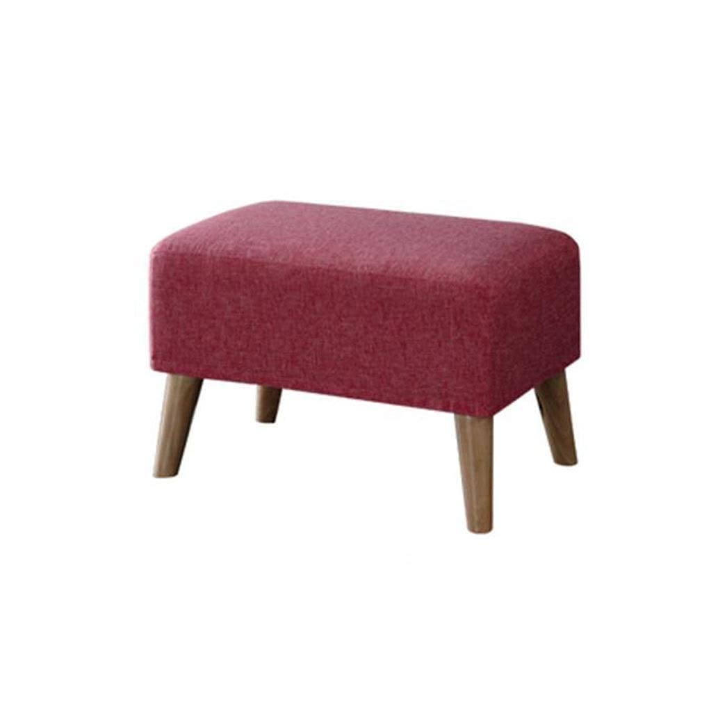 Repose-pieds en bois massif pour un salon cocooning chaleureux