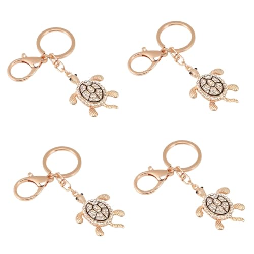 Bijou de clé tortue en strass aux finitions brillantes