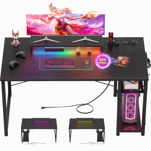 iSunirm Escritorio Gaming Negro 120 cm con LED y Enchufes, Mesa de Ordenador con Soporte de Monitor Ergonómico, Escritorio PC Reversible con Gancho para Auriculares, Estación de Trabajo Estable