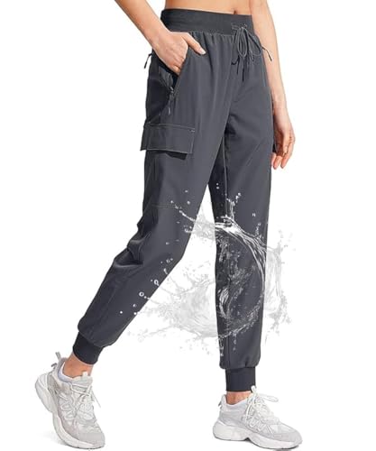 JENOANY Pantalones de senderismo para mujer, pantalones de chándal ligeros para invierno, UPF 50+, resistentes al agua, para correr, con bolsillos, Gris acero, Medium