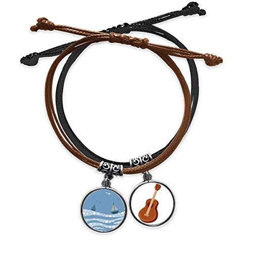 Pulsera de cuero trenzado con grabado artístico de paisaje marino y barco