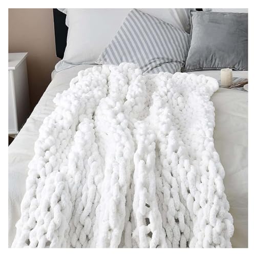 Couverture canapé grosse maille blanche pour soirée cocooning salon
