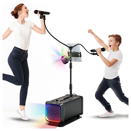 MASINGO Bluetooth Karaoke Machine for Adults and Kids - 2 Wireless Karaoke Microphones with Duet Mic Stand - Portable PA Speaker System, Disco Ball, Party Lights, TV Cable & Guitar Plug in - Lento X5